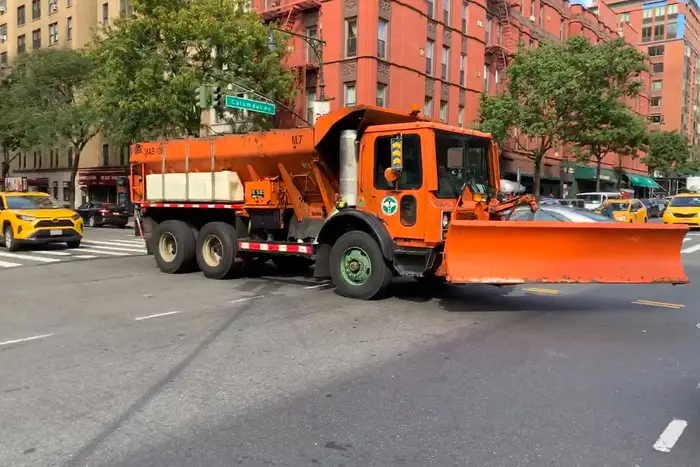 This is a photo of a DSNY snow plow and salt spreader.